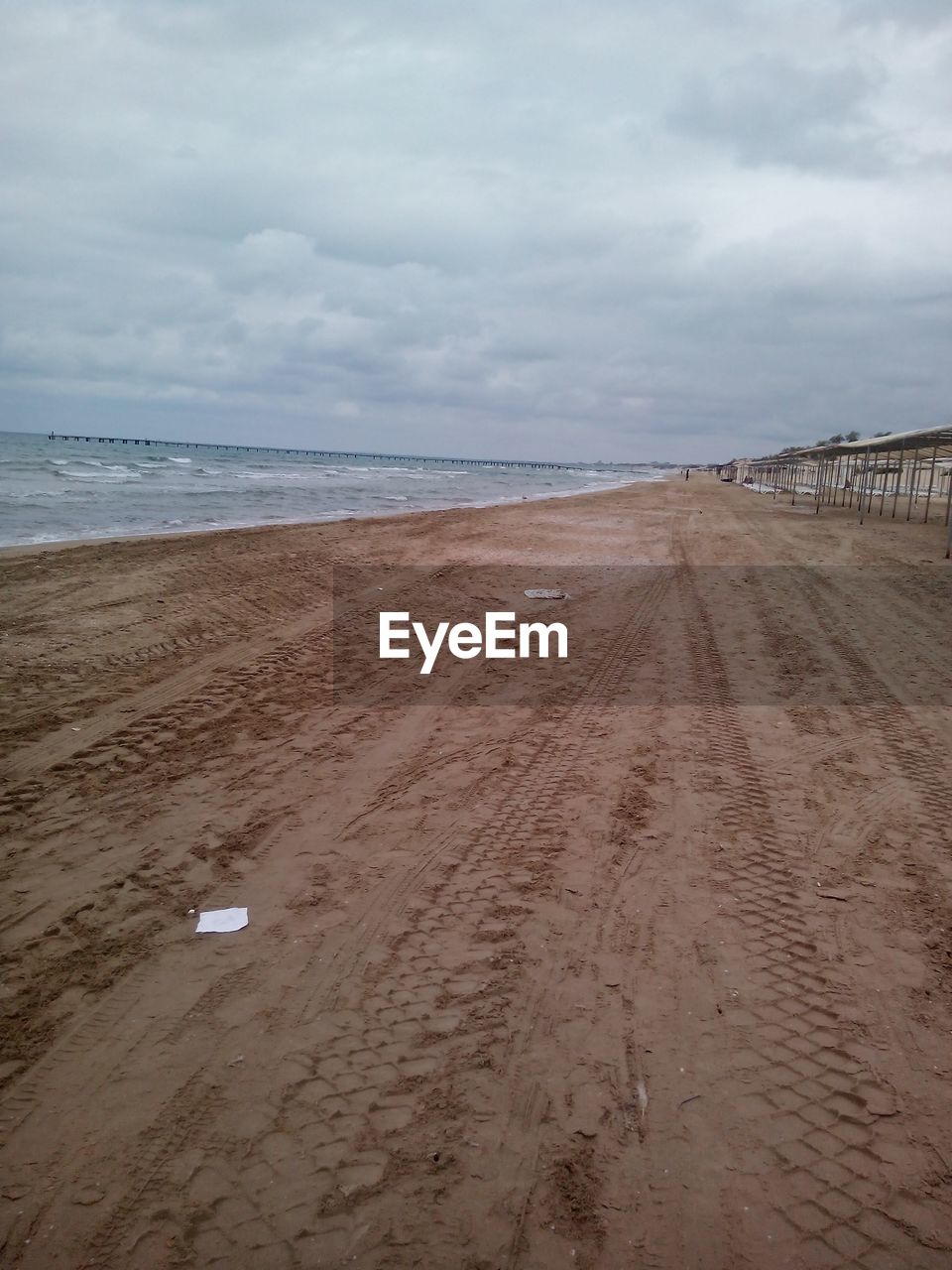 BEACH AGAINST SKY