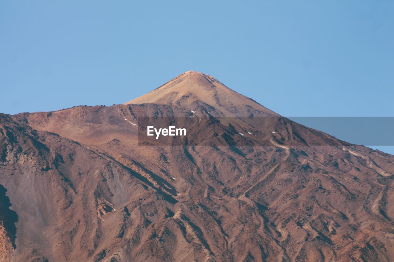 LOW ANGLE VIEW OF MOUNTAIN AGAINST SKY