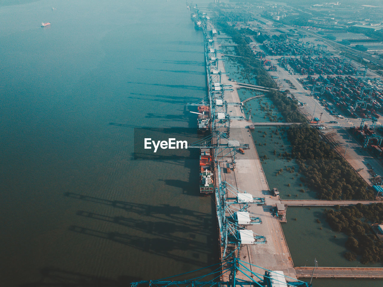 Aerial view of freight transportation on sea in city