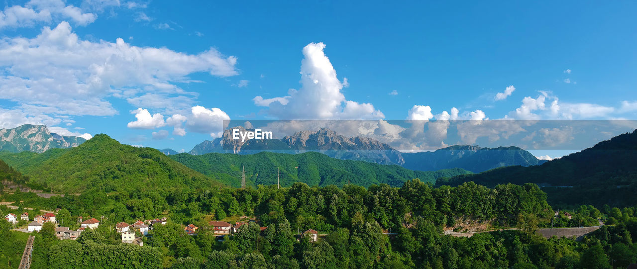 PANORAMIC VIEW OF LANDSCAPE AND MOUNTAINS AGAINST SKY