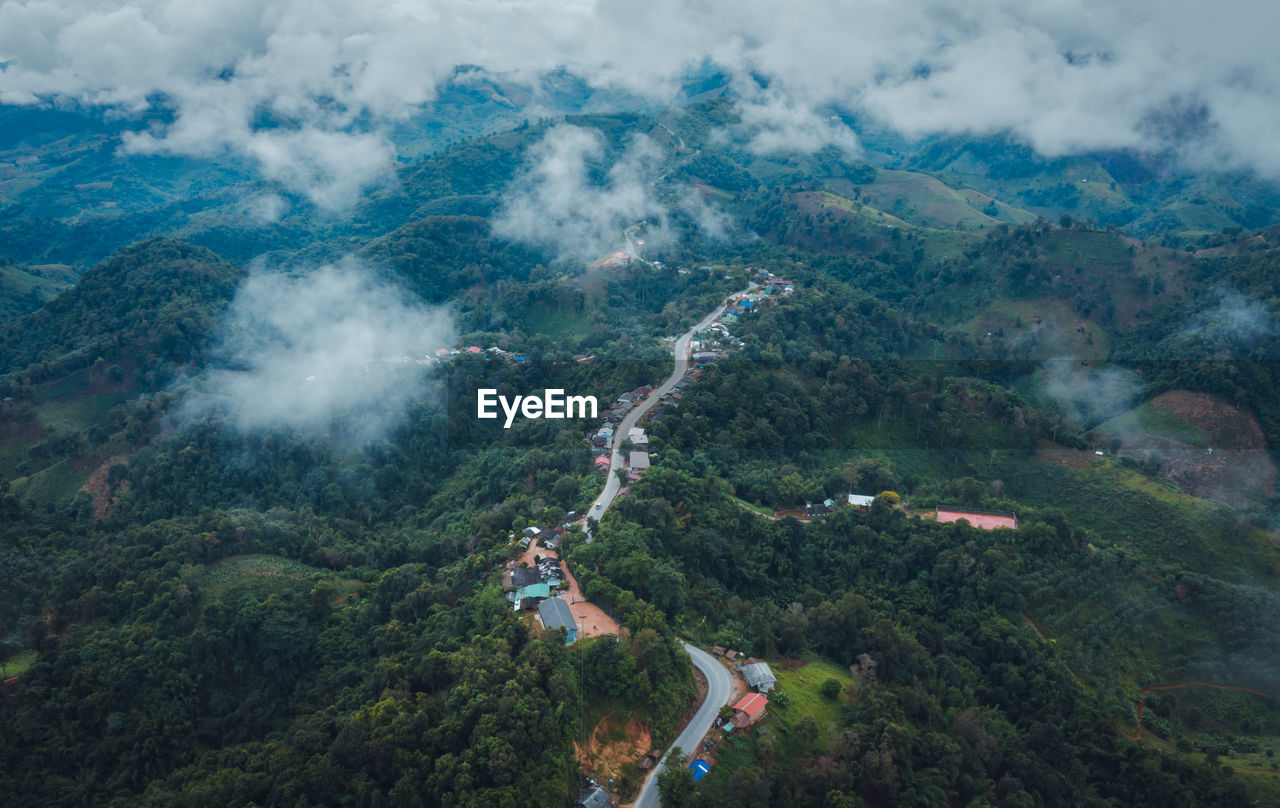 High angle view of trees on landscape against sky