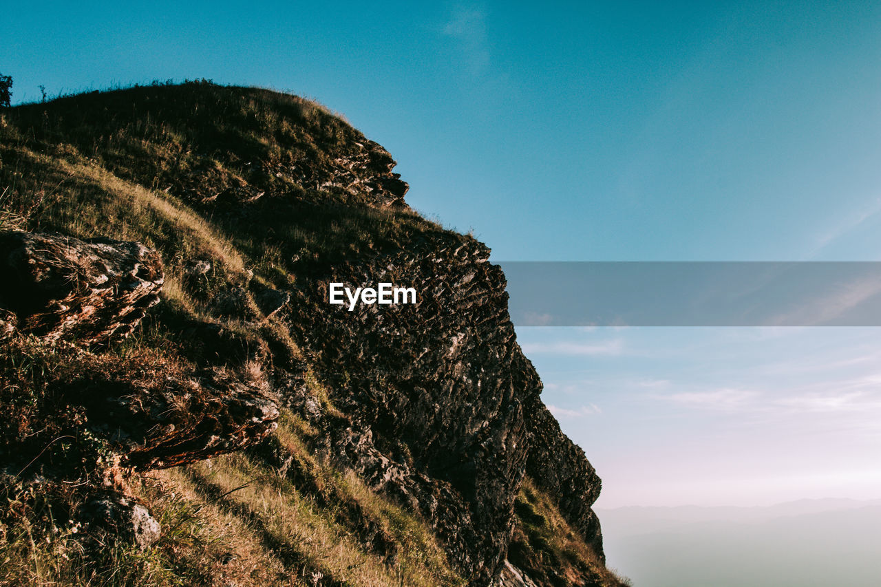 Low angle view of mountain against sky