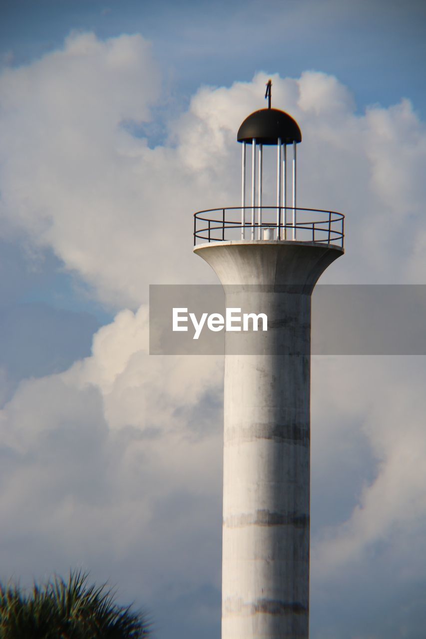 LOW ANGLE VIEW OF WATER TOWER AGAINST CLOUDY SKY