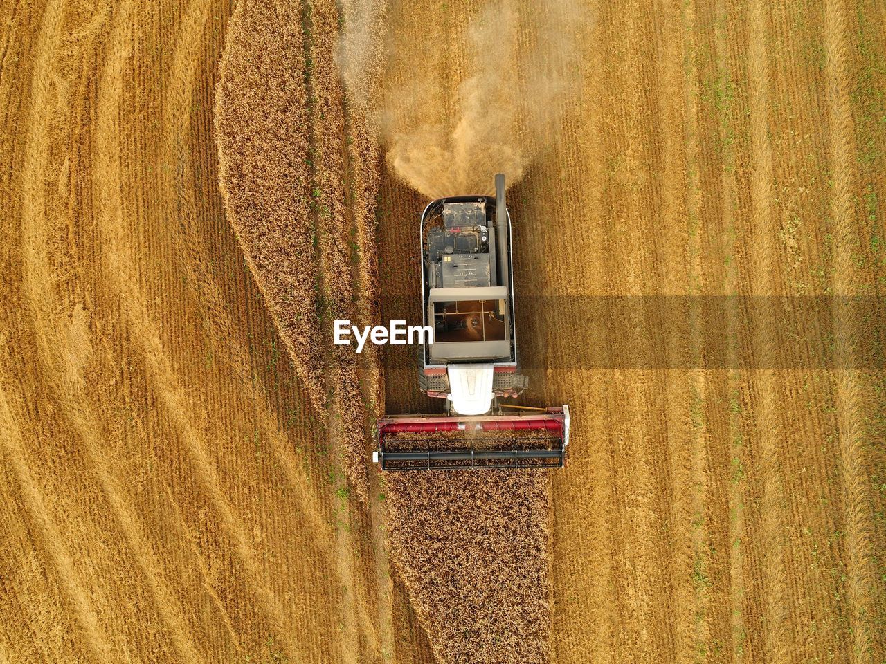 Directly above shot of agricultural machinery on field