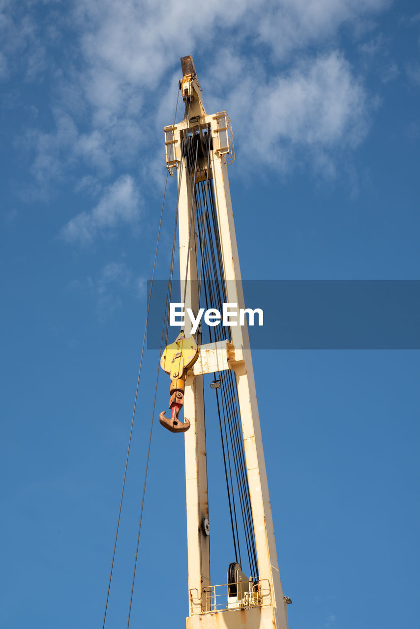 low angle view of crane against clear sky