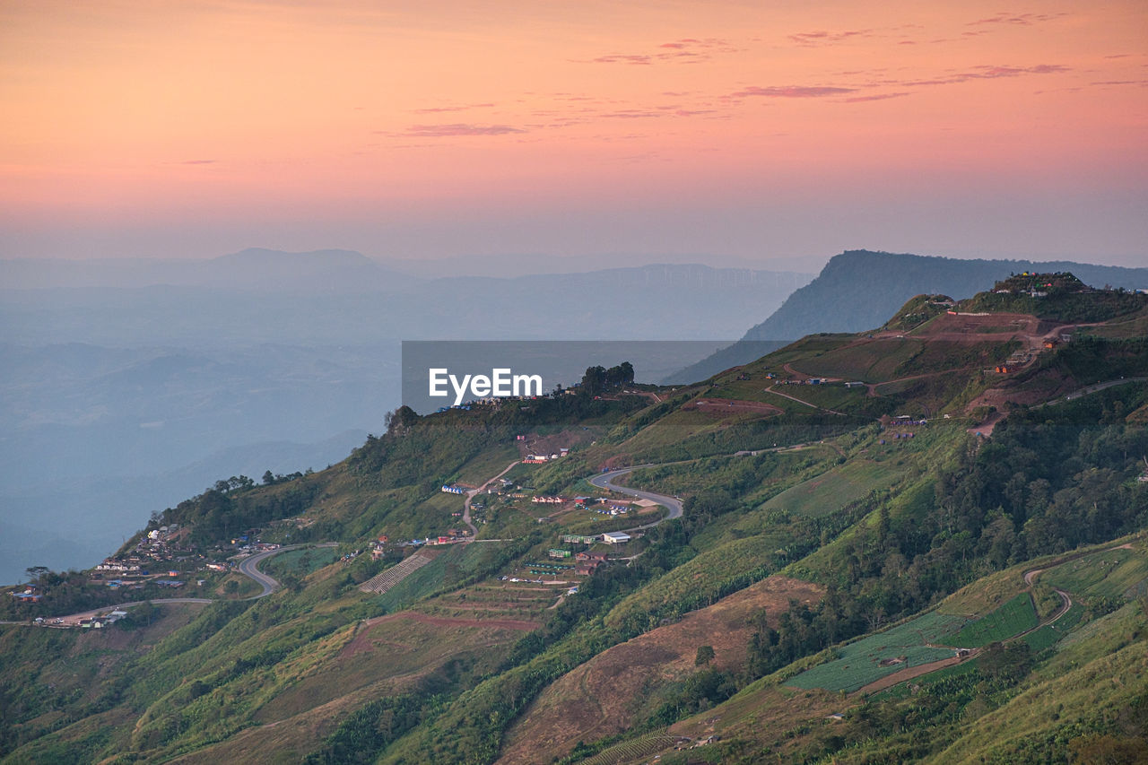 Scenic view of landscape against sky during sunset