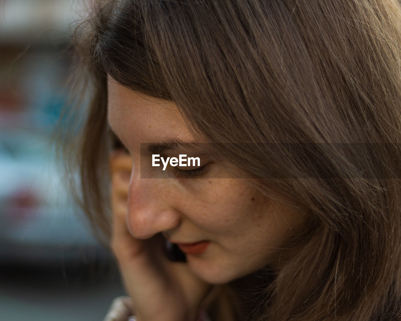 Young woman talking on mobile phone