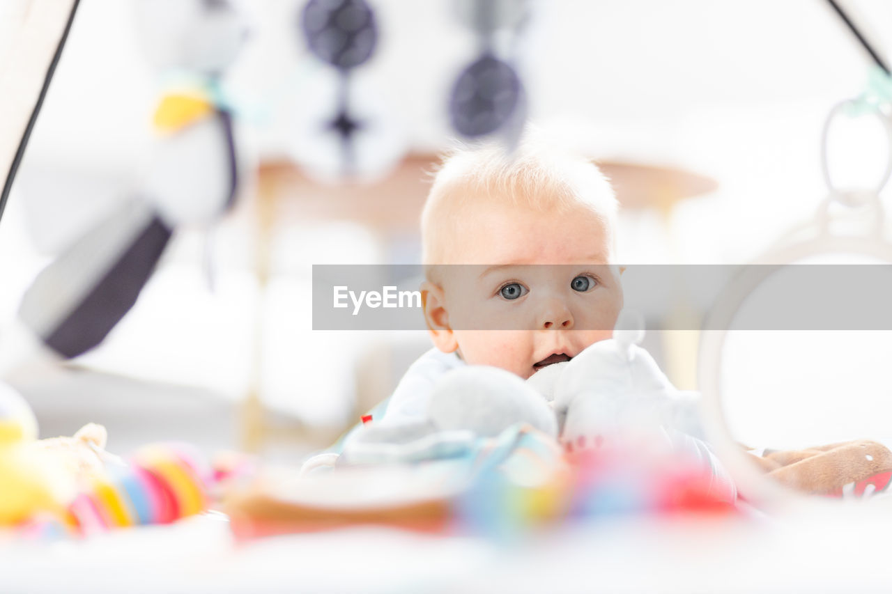 portrait of cute baby girl at home