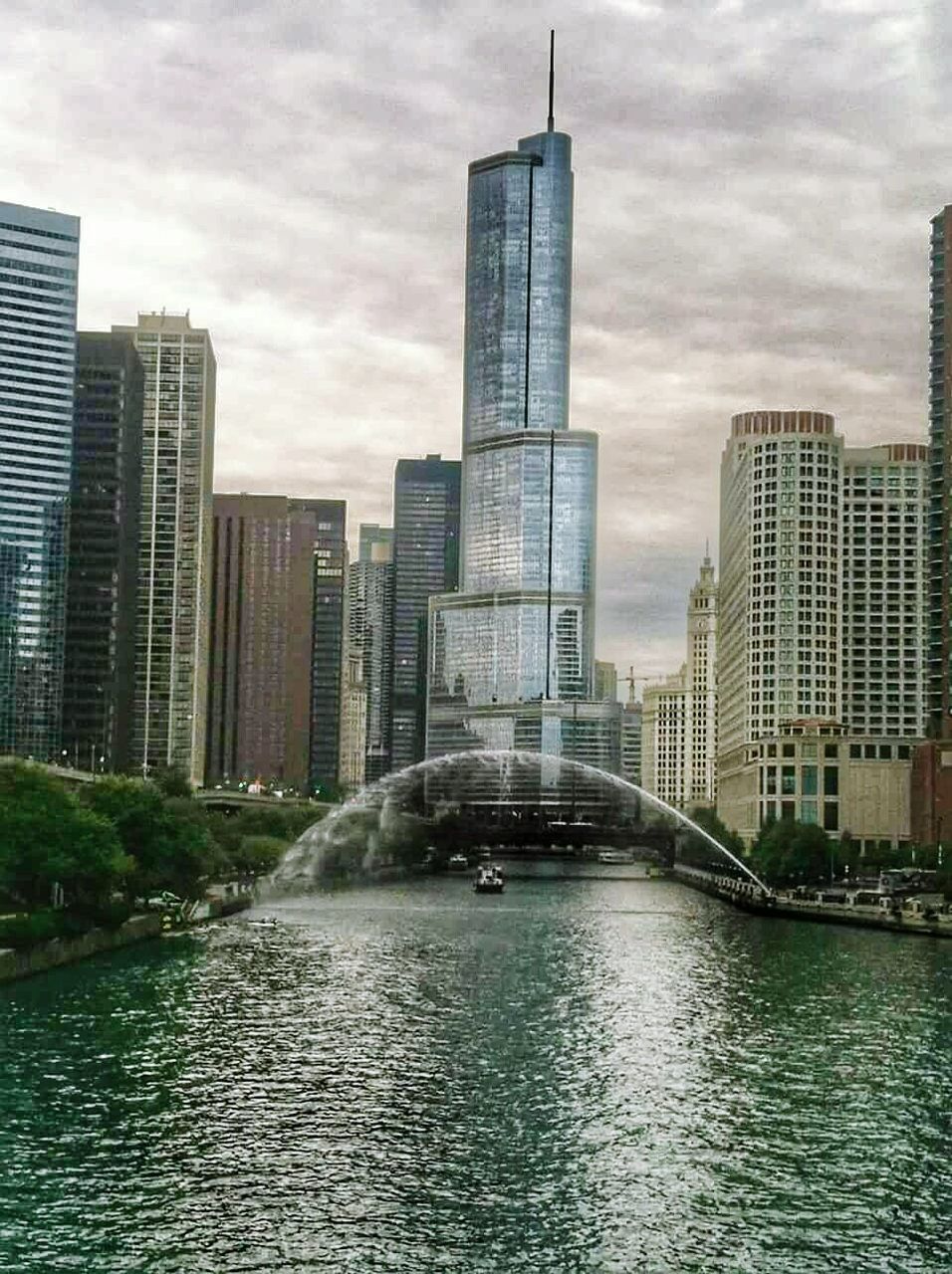 City skyline against cloudy sky