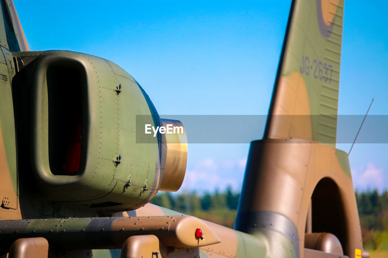 Close-up of cropped helicopter against clear blue sky