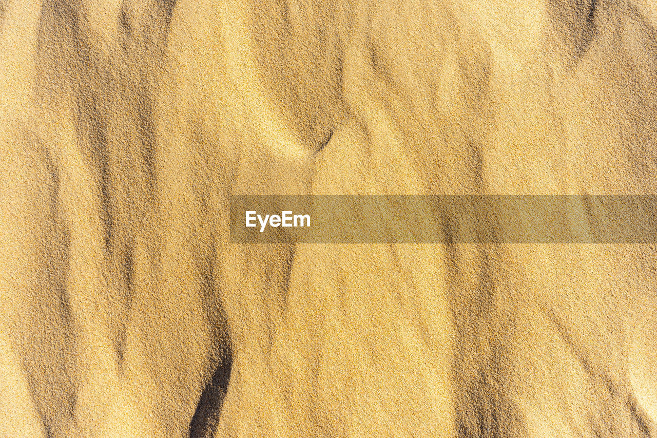 full frame shot of sand at beach