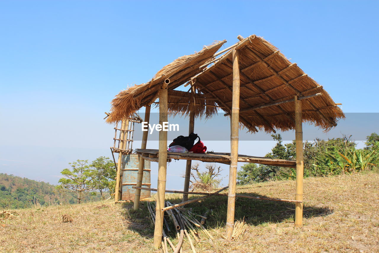 Built structure on field against clear sky