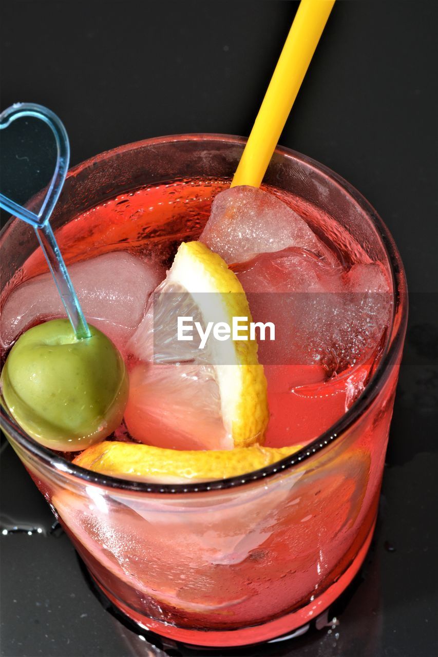 CLOSE-UP OF FRUITS WITH DRINK