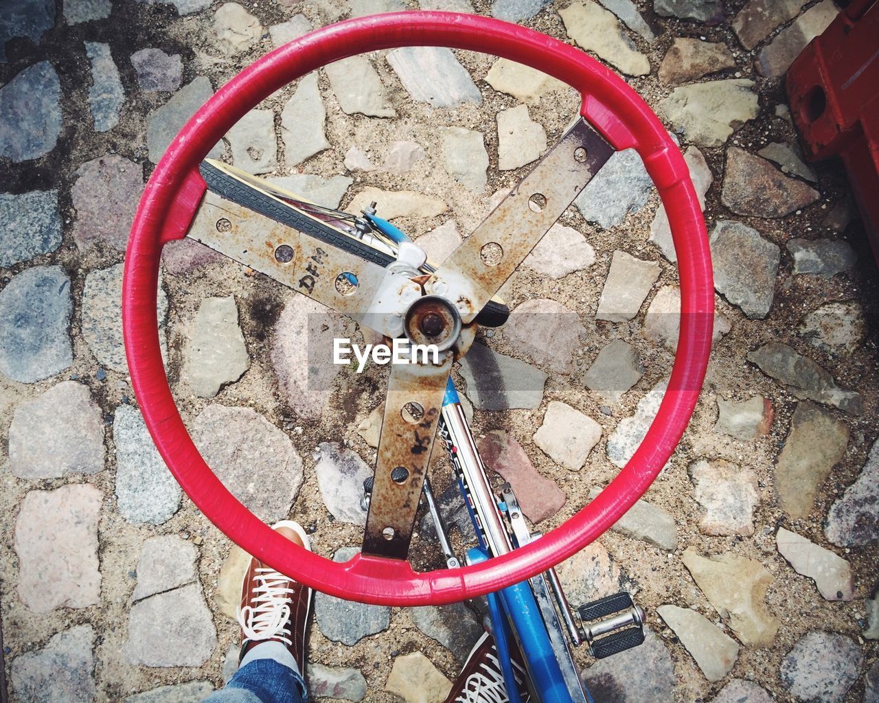 High angle view of red bicycle handle bars
