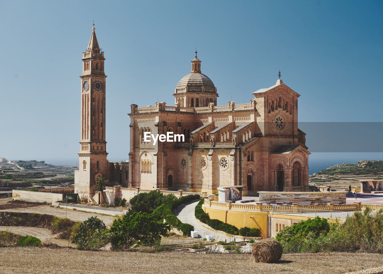 Low angle view of cathedral against clear sky on gozo