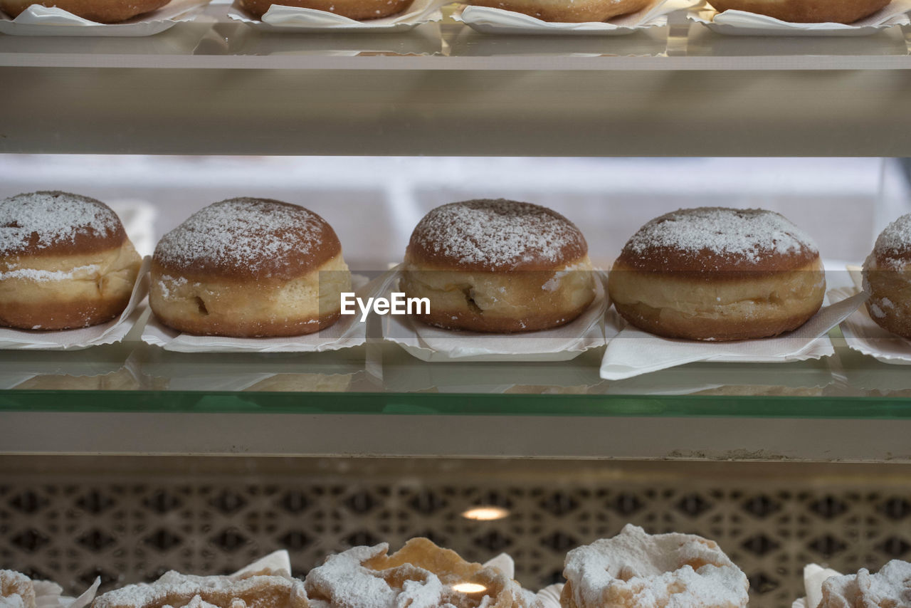 Traditional german doughnut with powder sugar, also called berliner or krapfen