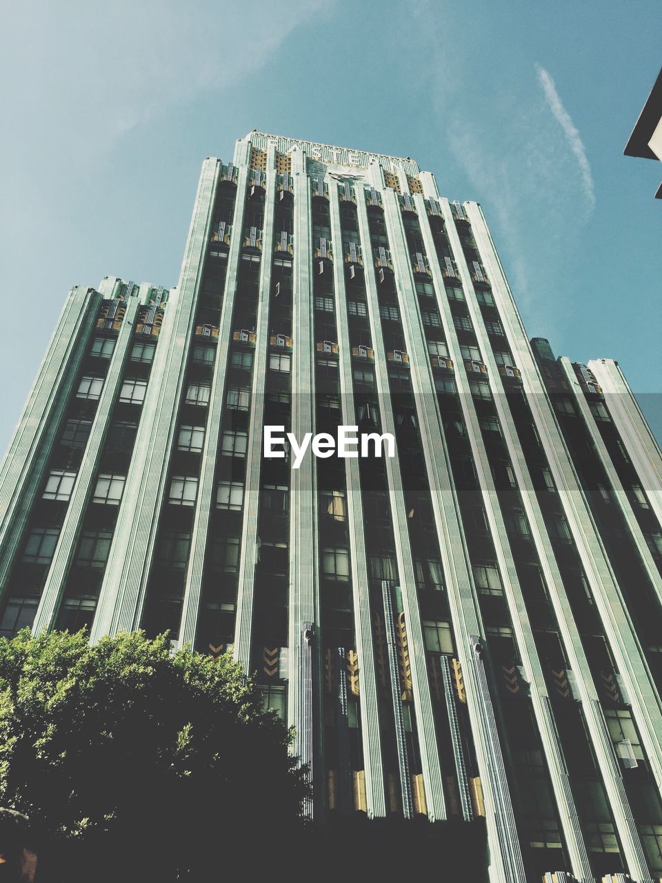 LOW ANGLE VIEW OF MODERN BUILDINGS AGAINST SKY