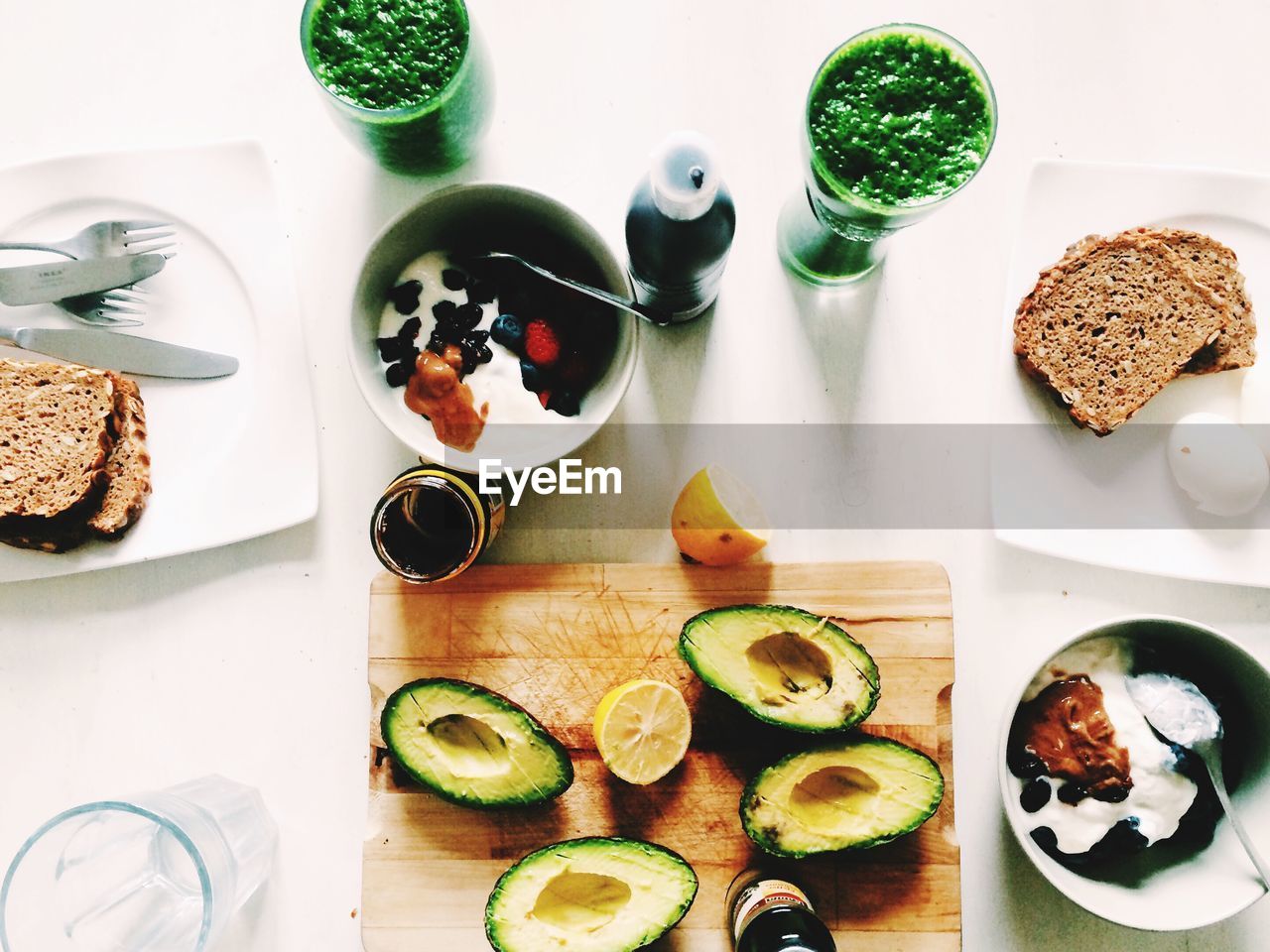 High angle view of avocado and breakfast in table