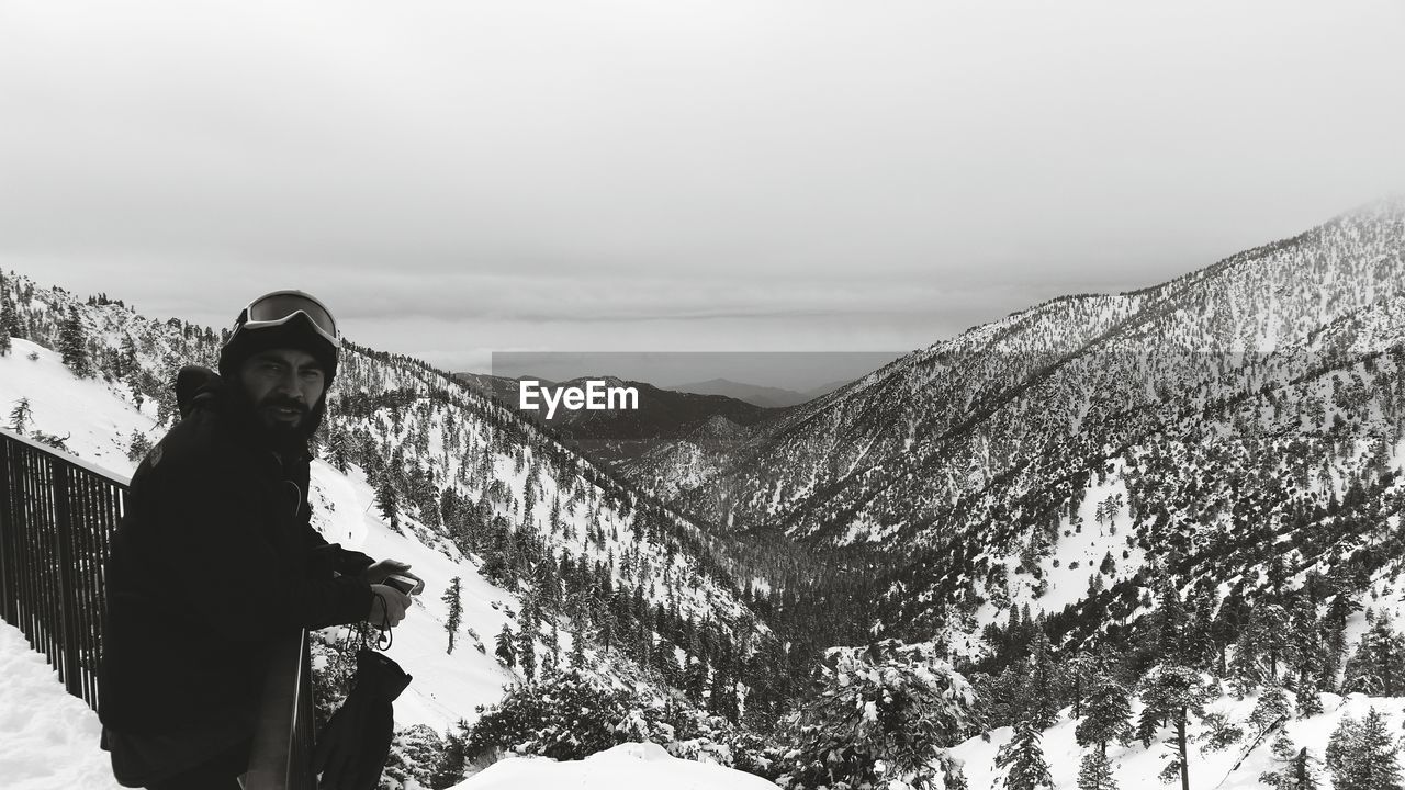 SCENIC VIEW OF SNOW COVERED MOUNTAINS