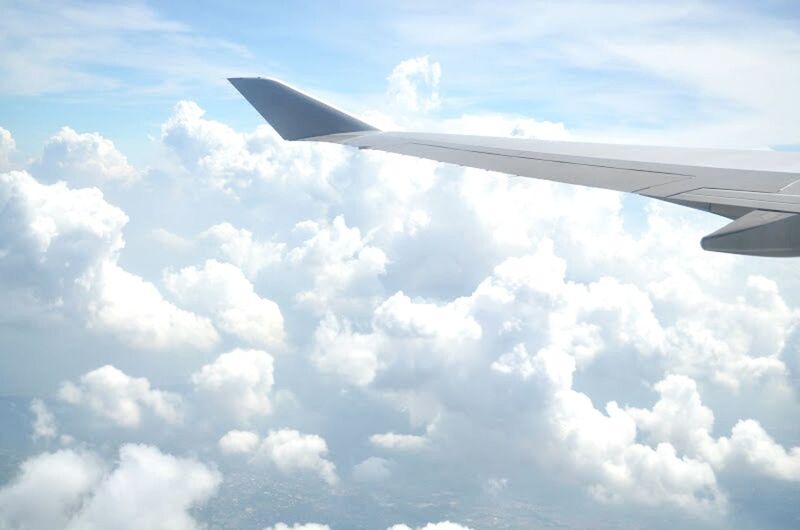 CROPPED IMAGE OF AIRPLANE WING