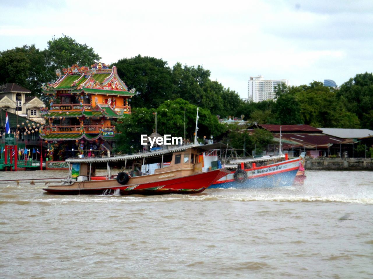 VIEW OF BOATS IN SEA