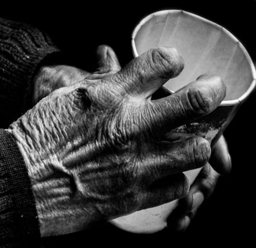 CROPPED IMAGE OF HAND HOLDING WHITE WALL