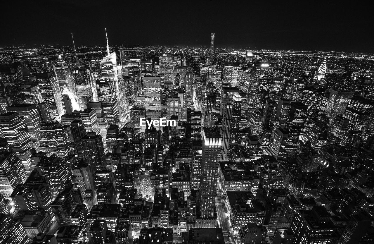 High angle view of illuminated city at night