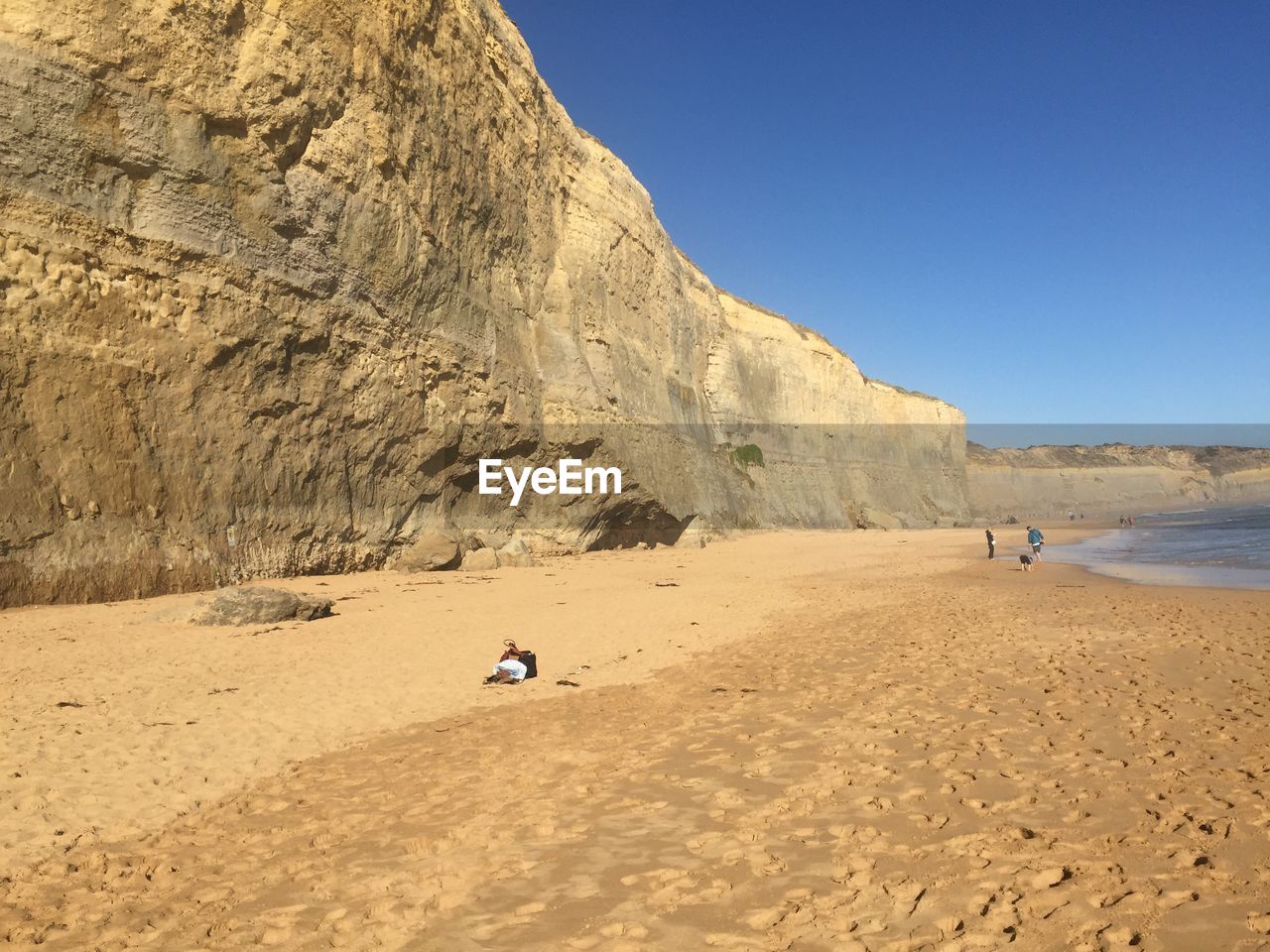 Scenic view of beach against clear sky