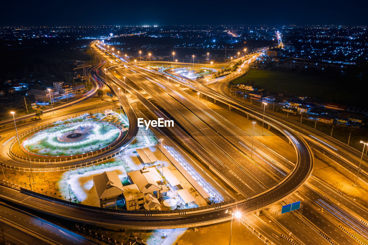 Aerial view of light trails on elevated road at night