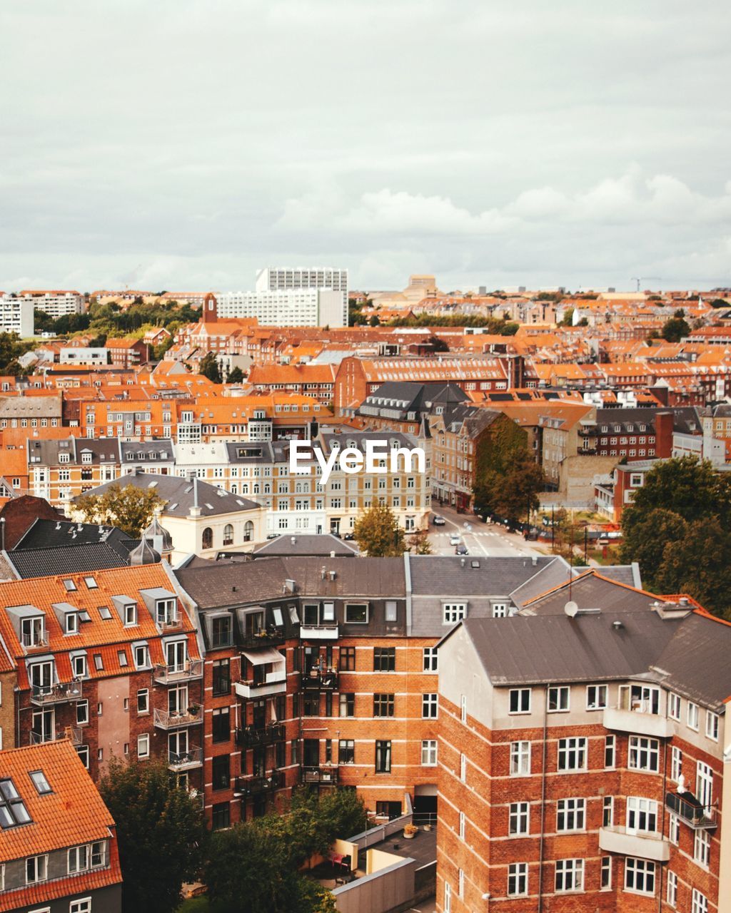 High angle view of buildings in city against sky