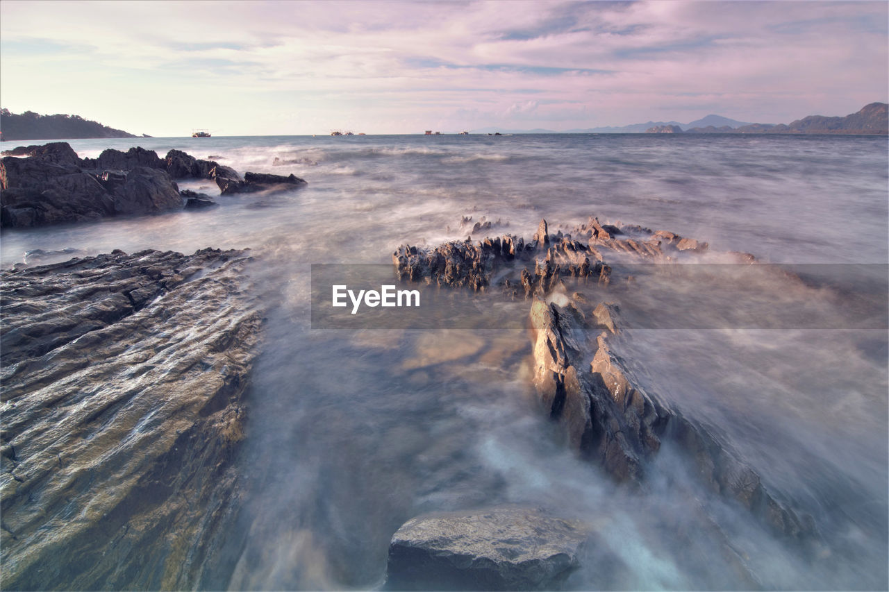 Scenic view of sea against sky during sunset