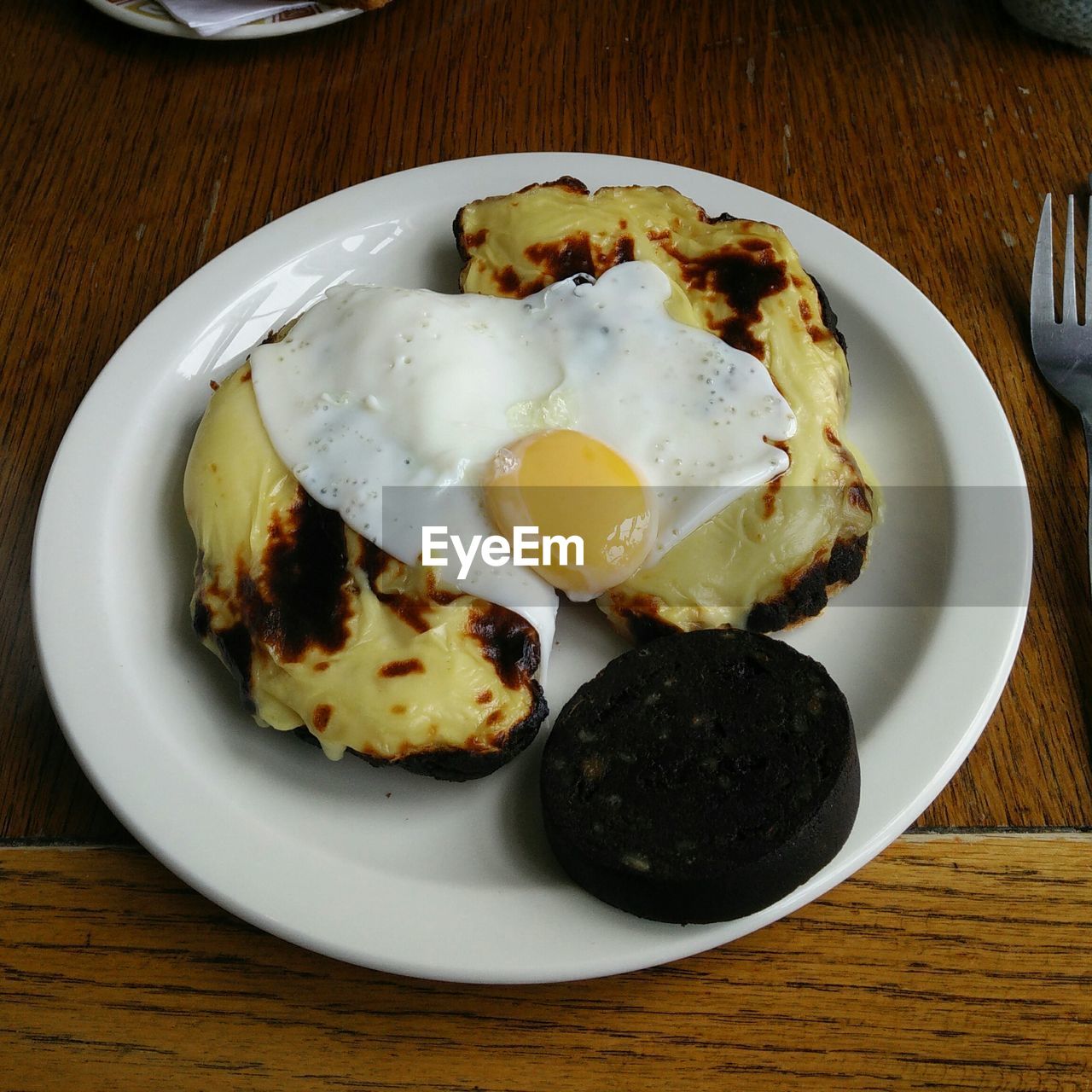 Close-up of breakfast served in plate on table