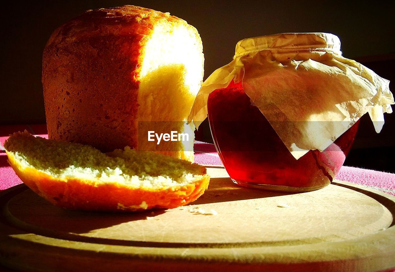 Close-up of bread and preserves on table