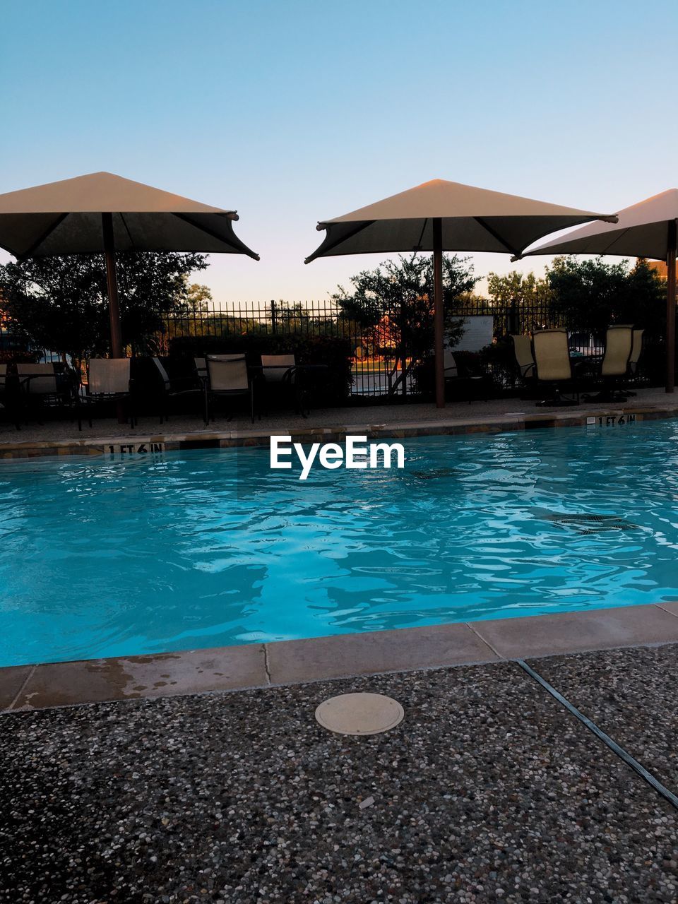 SWIMMING POOL AGAINST CLEAR SKY