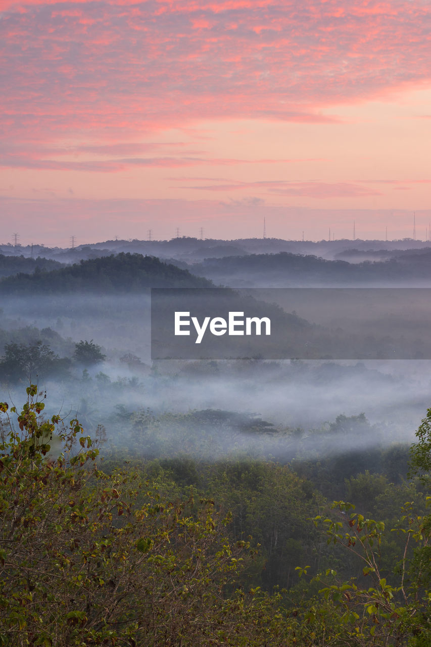 SCENIC VIEW OF LANDSCAPE DURING SUNSET