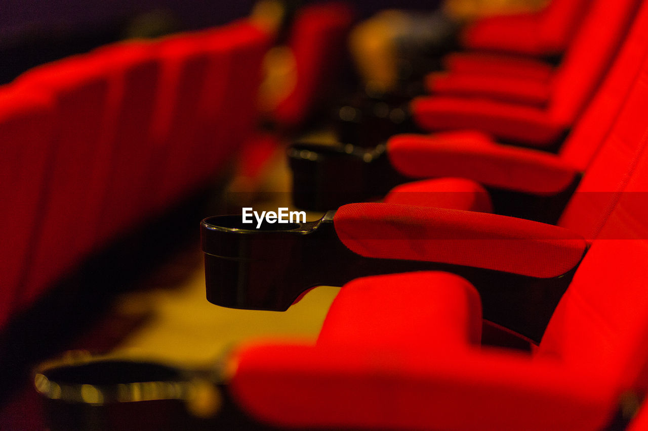 Close-up of empty seats in movie theater