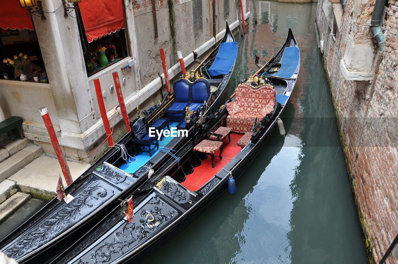 High angle view of boats moored in canal