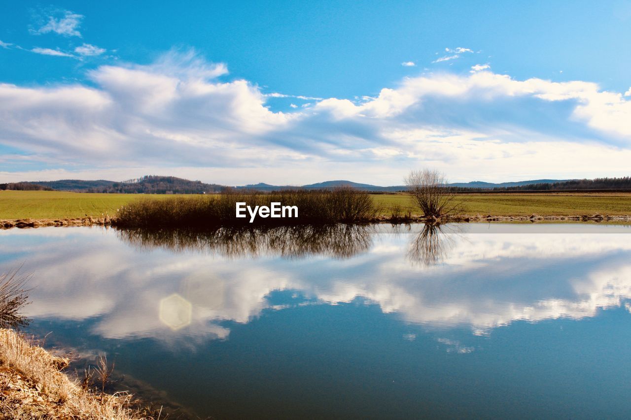 Scenic view of lake against sky