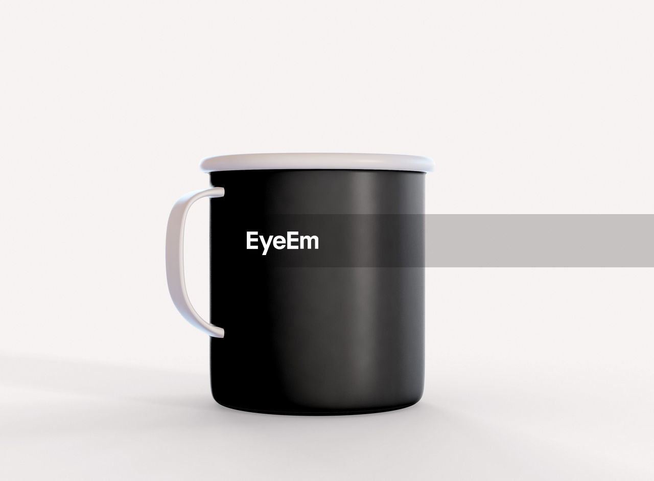 CLOSE-UP OF COFFEE OVER WHITE BACKGROUND