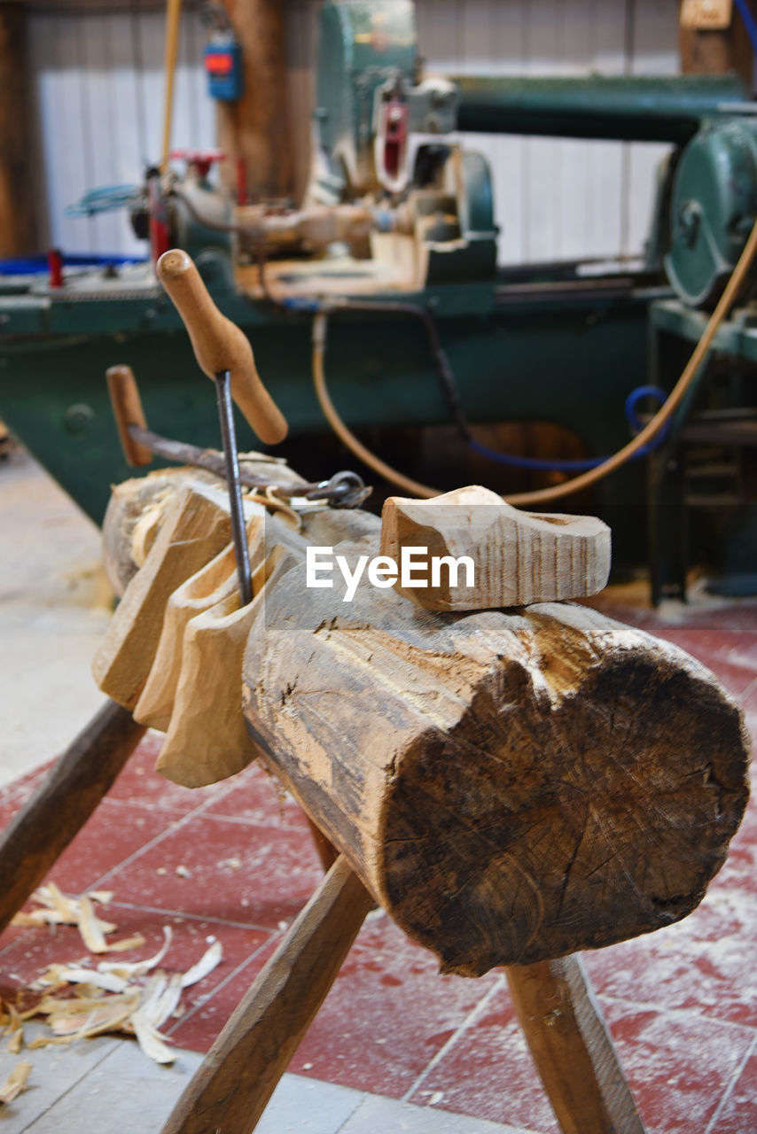 cropped image of man working on wood