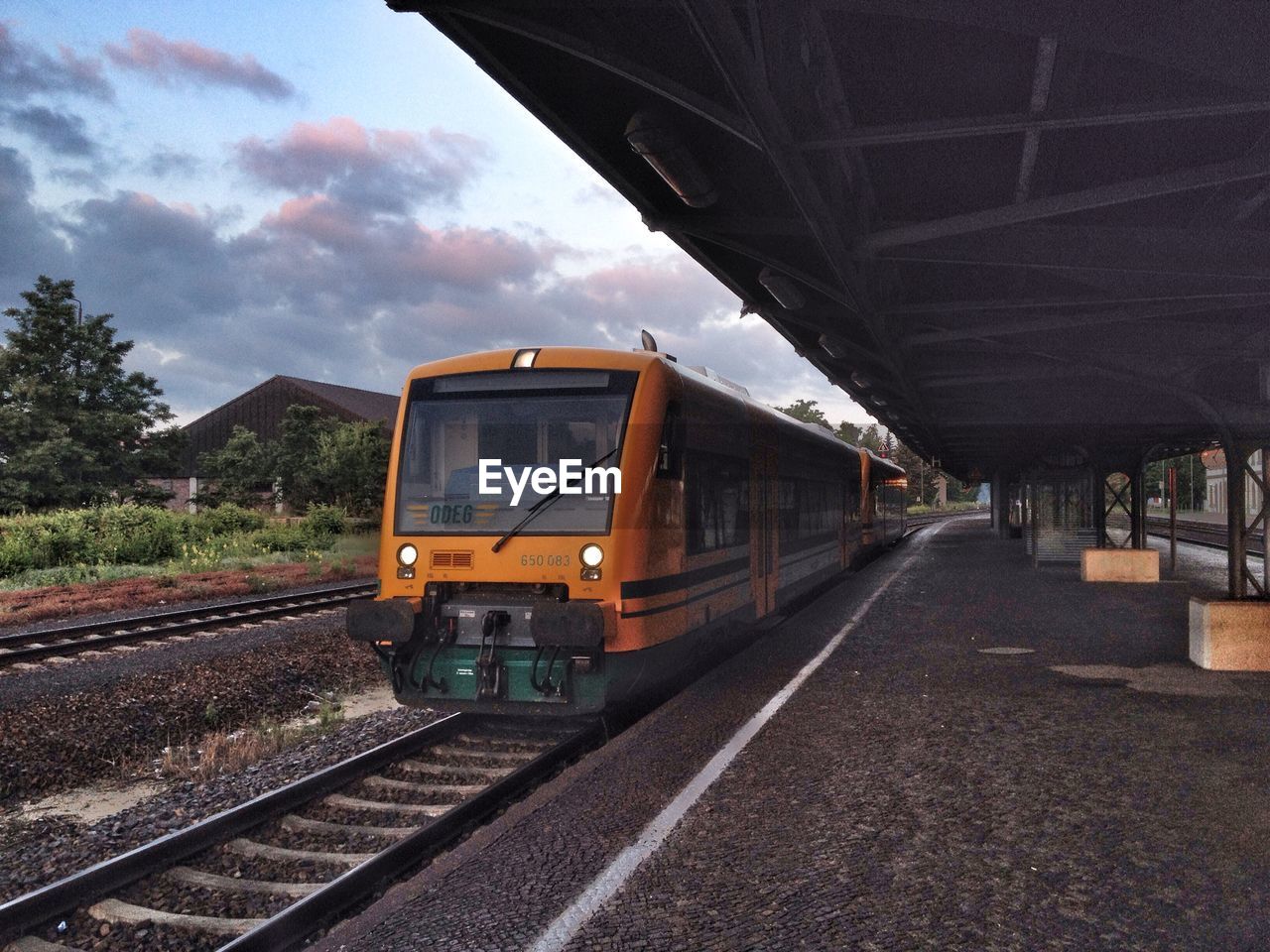 TRAIN ON RAILROAD TRACKS