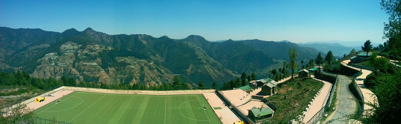 PANORAMIC VIEW OF LANDSCAPE AGAINST BLUE SKY