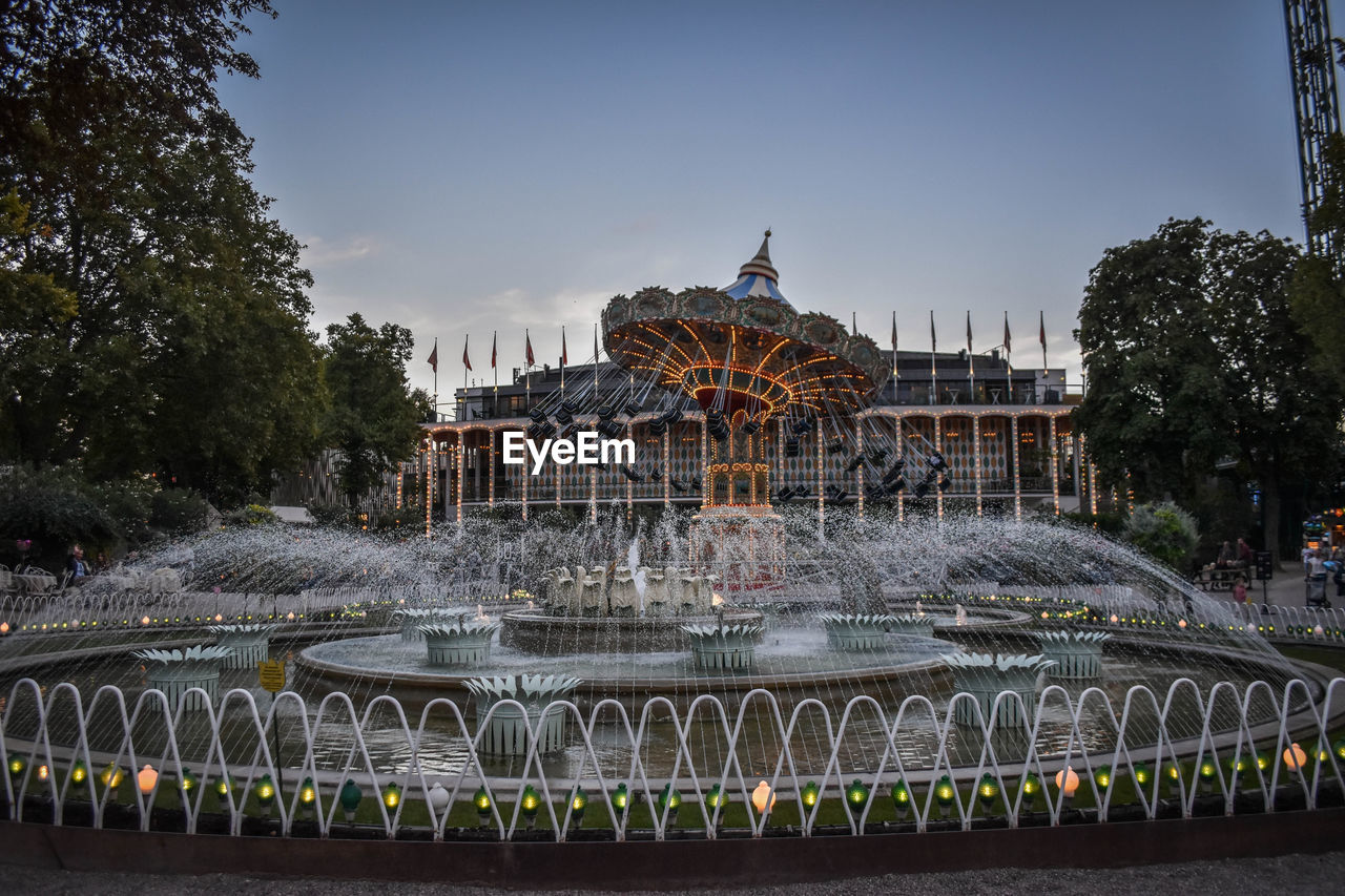 Tivoli gardens amusement park in central copenhagen offers rides, games, musicals, major concerts.