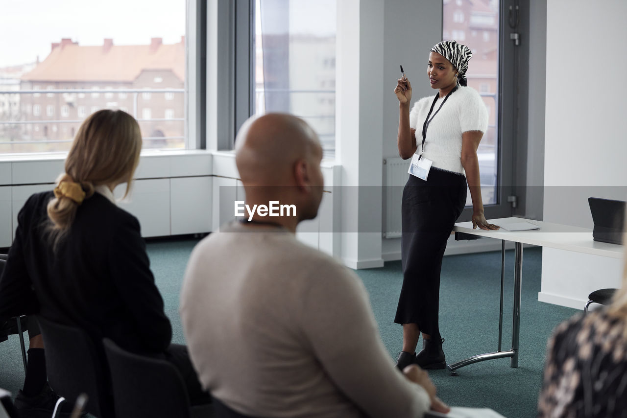 Woman having presentation during business meeting