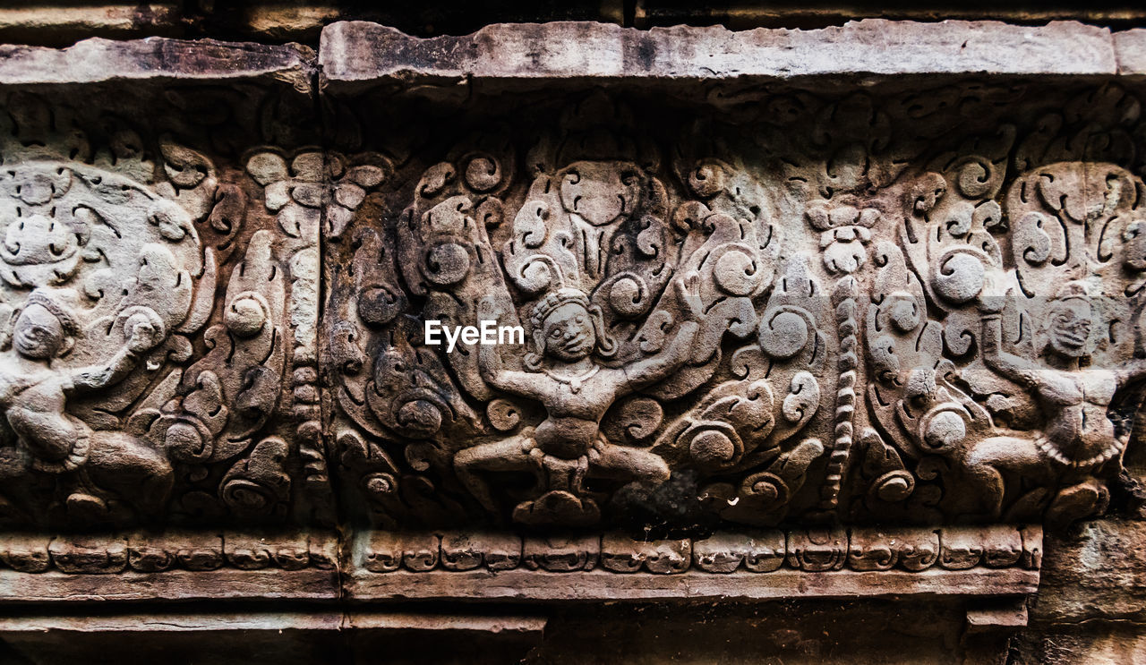 architecture, iron, craft, no people, temple, art, built structure, history, ancient history, creativity, the past, wood, pattern, building, temple - building, ancient, close-up, full frame, relief, day, religion, representation, sculpture, ornate, wall, outdoors, belief, building exterior, wall - building feature, stone carving, old