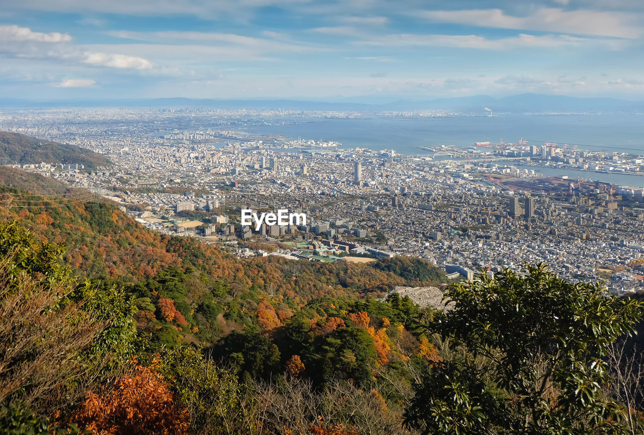 Aerial view of cityscape against sky