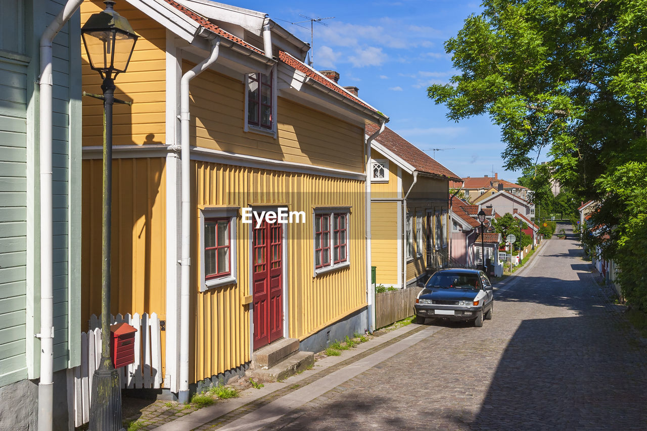 Idyllic city street with old wooden houses