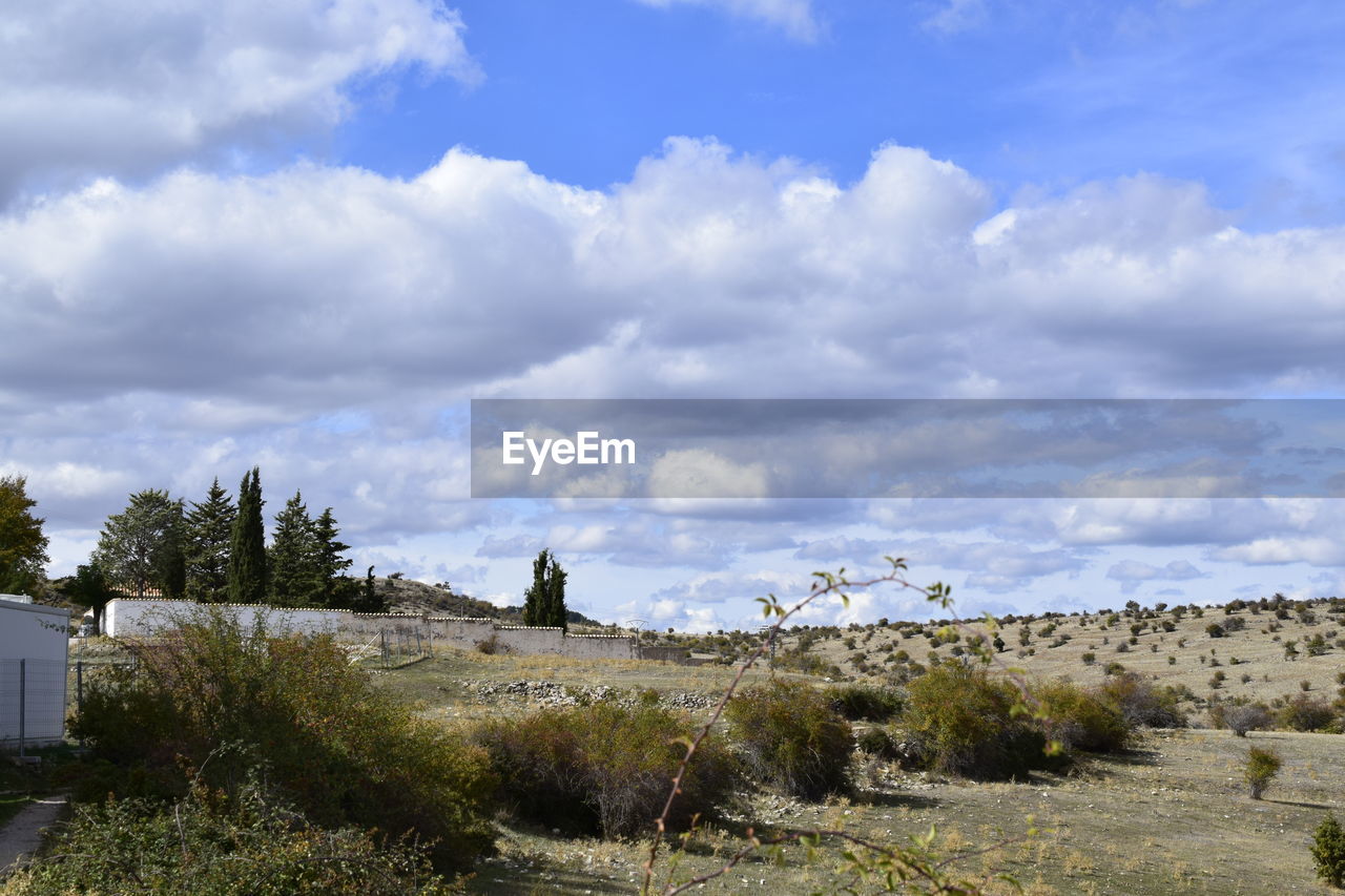 Scenic view of land against sky