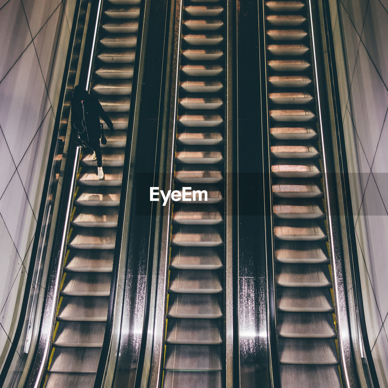 High angle view of person on escalator