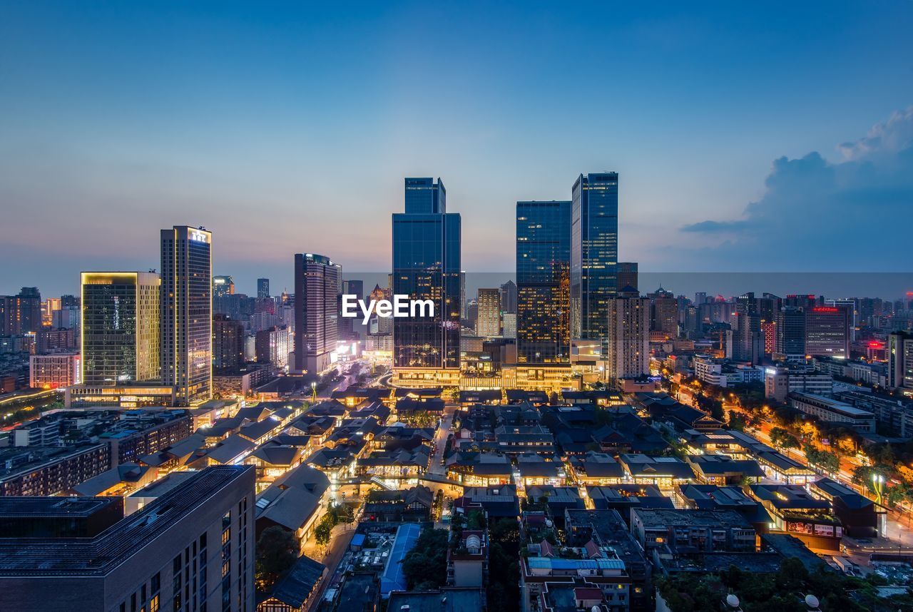 High angle view of illuminated cityscape at night